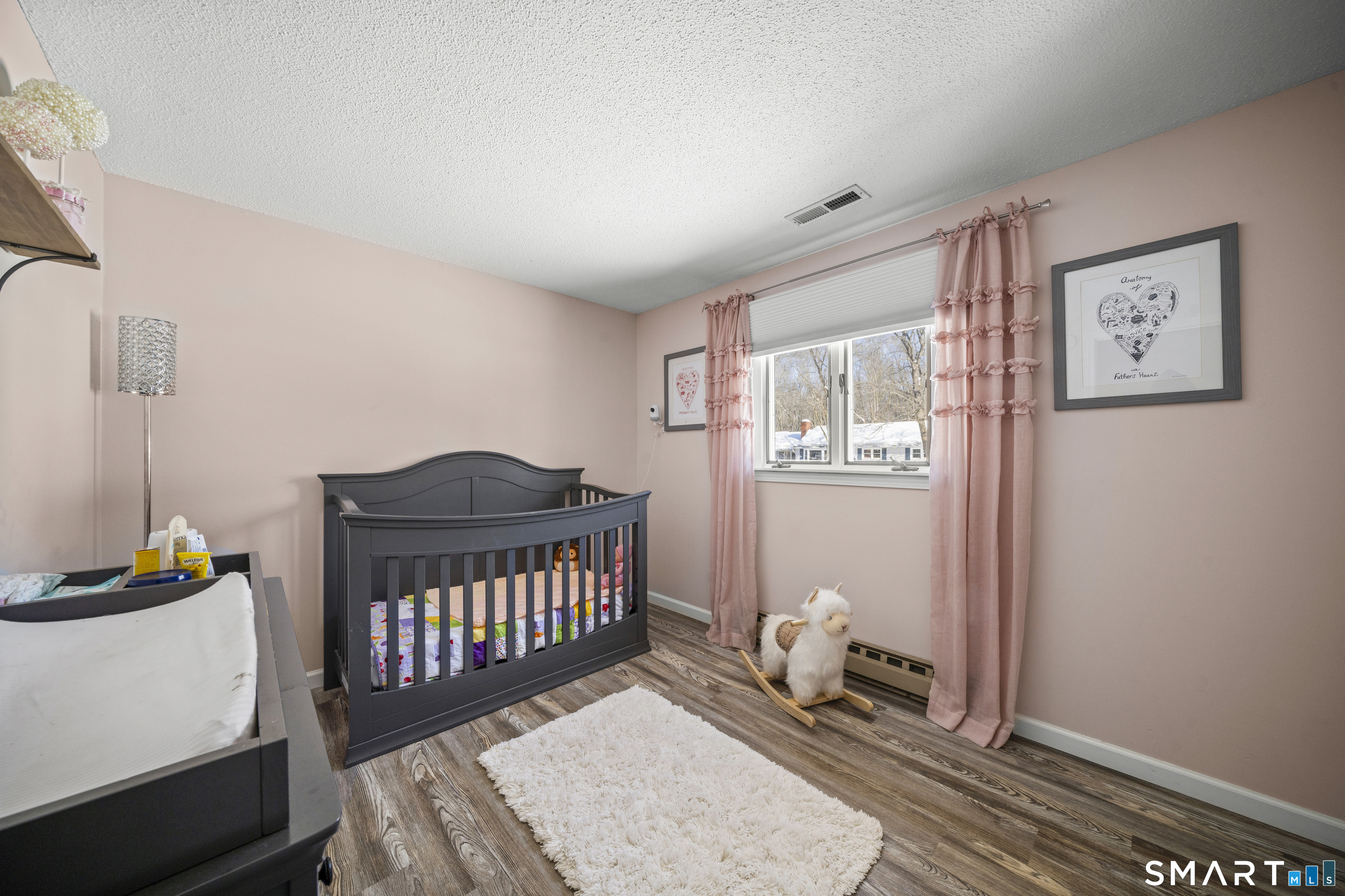 51 Barrett Road Enfield, CT 06082 - Photo 18 of 35 a bedroom with furniture and a window