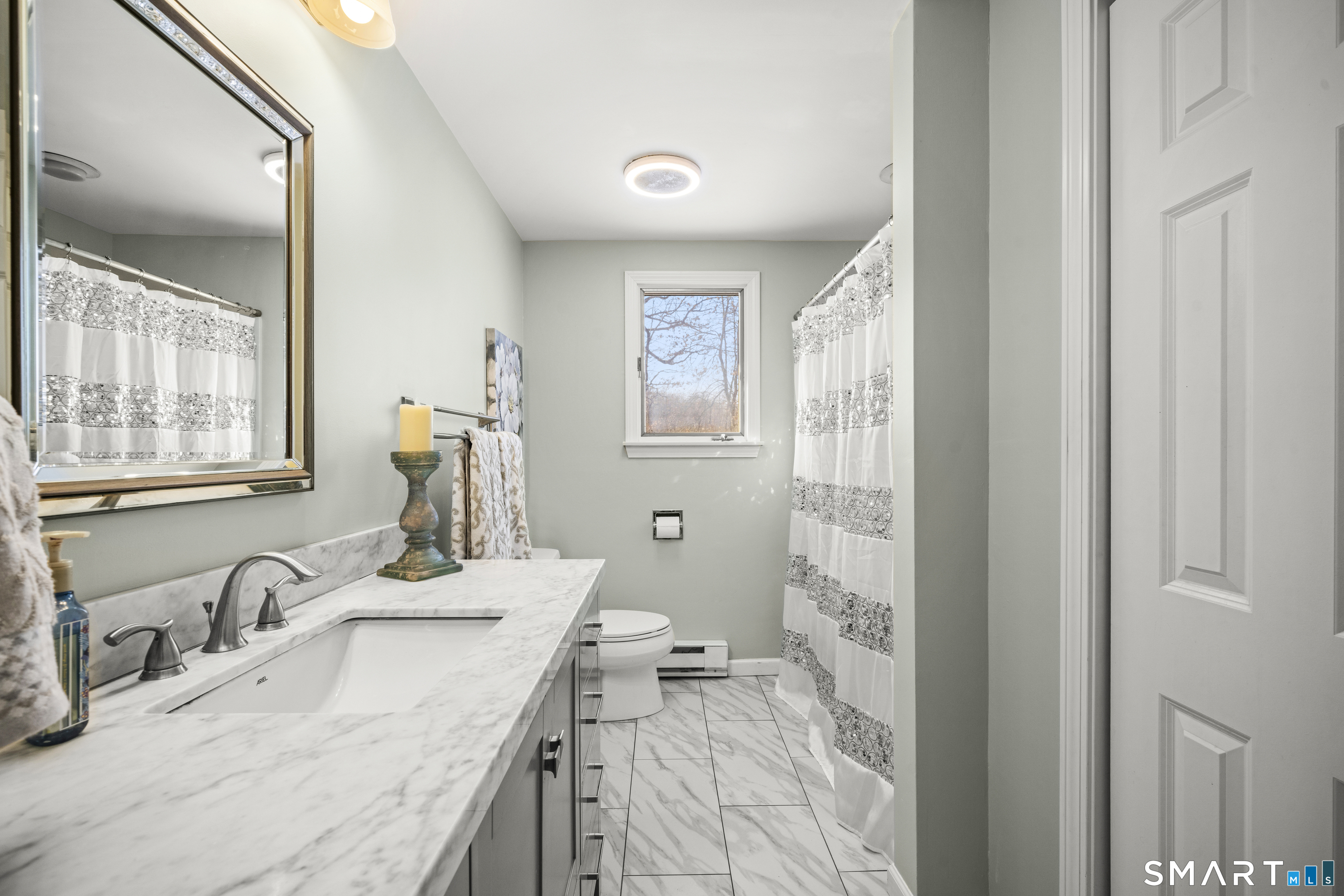 51 Barrett Road Enfield, CT 06082 - Photo 25 of 35 a bathroom with a sink double vanity and a granite