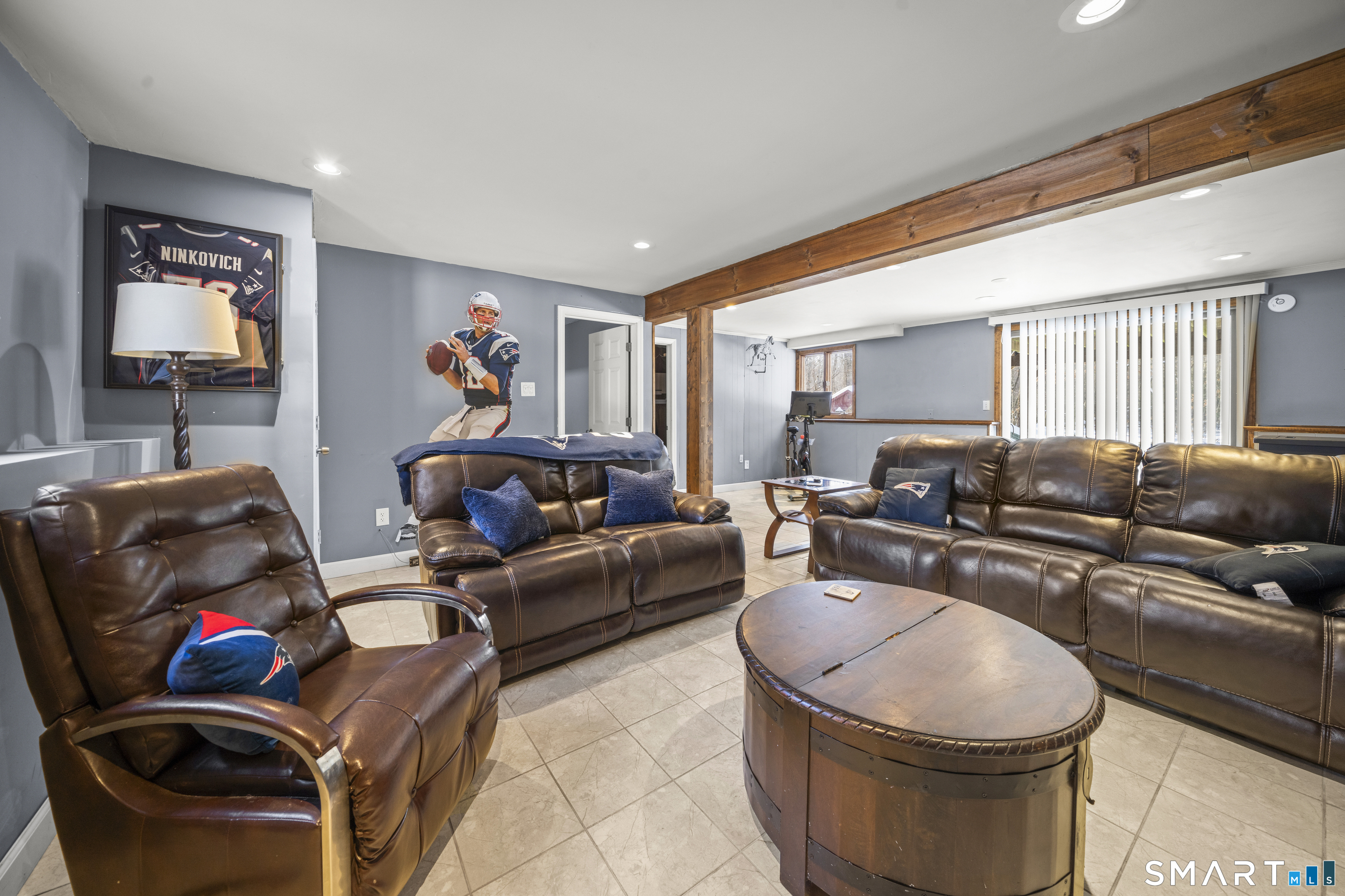 51 Barrett Road Enfield, CT 06082 - Photo 28 of 35 a living room with furniture a rug and a window