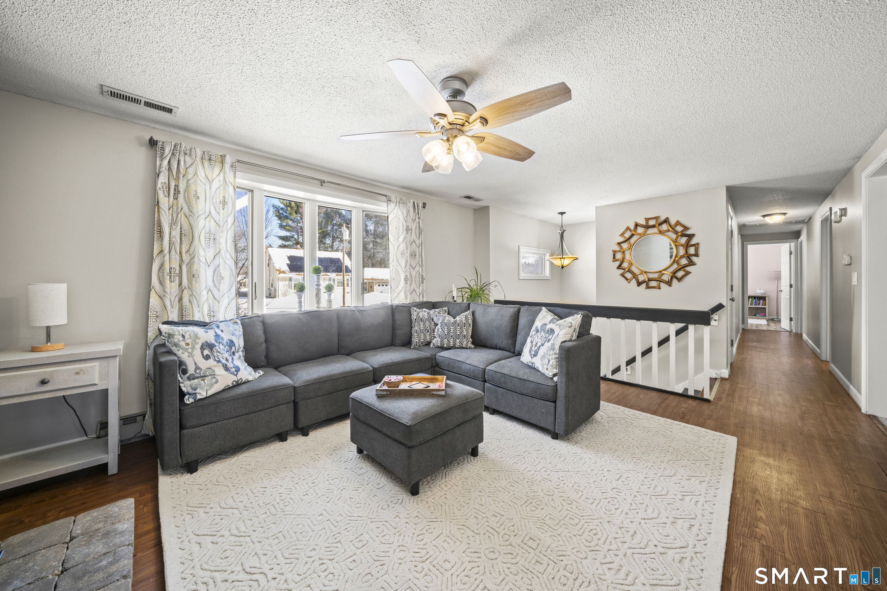 51 Barrett Road Enfield, CT 06082 - Photo 6 of 35 a living room with furniture and a large window