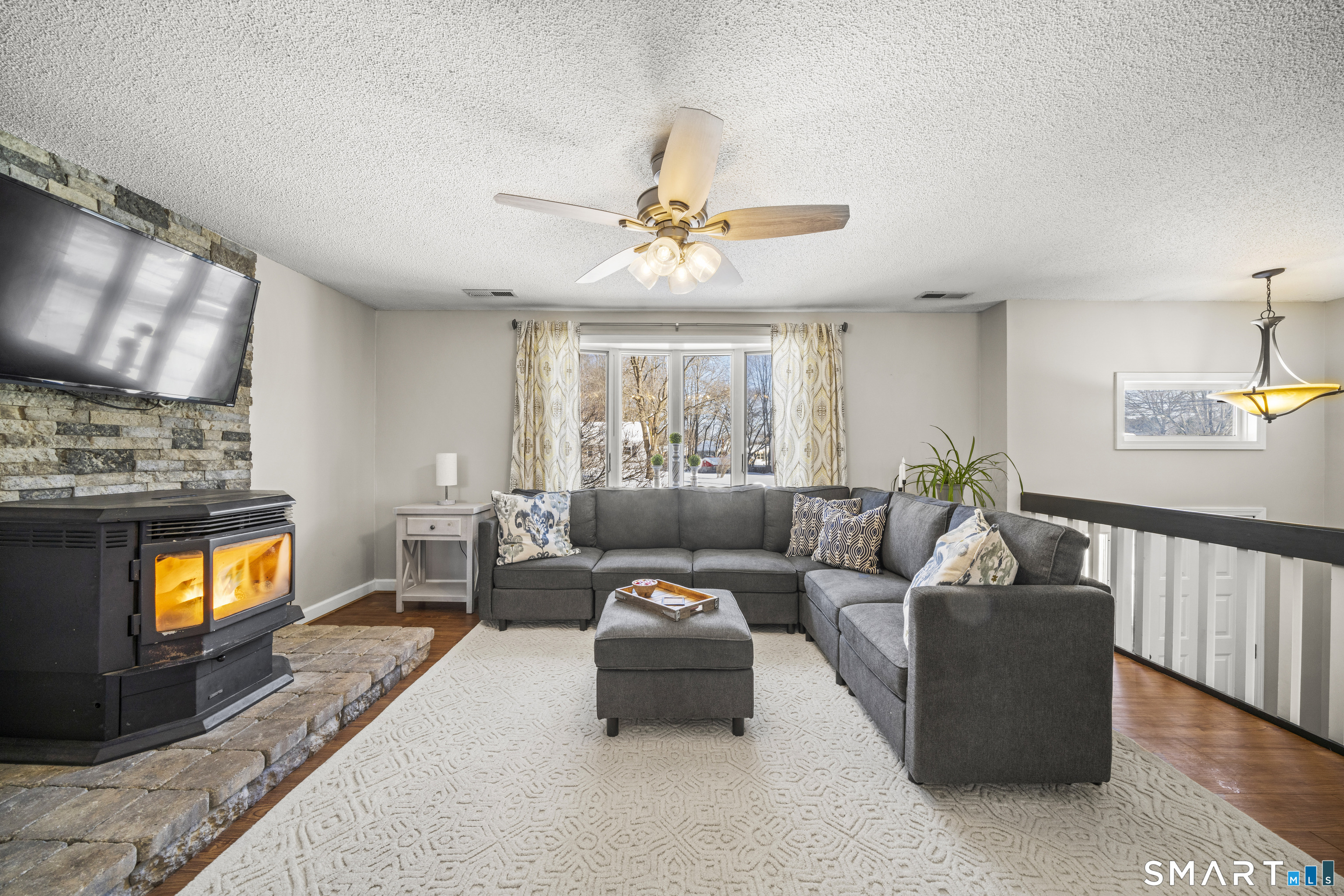 51 Barrett Road Enfield, CT 06082 - Photo 8 of 35 a living room with furniture and a flat screen tv