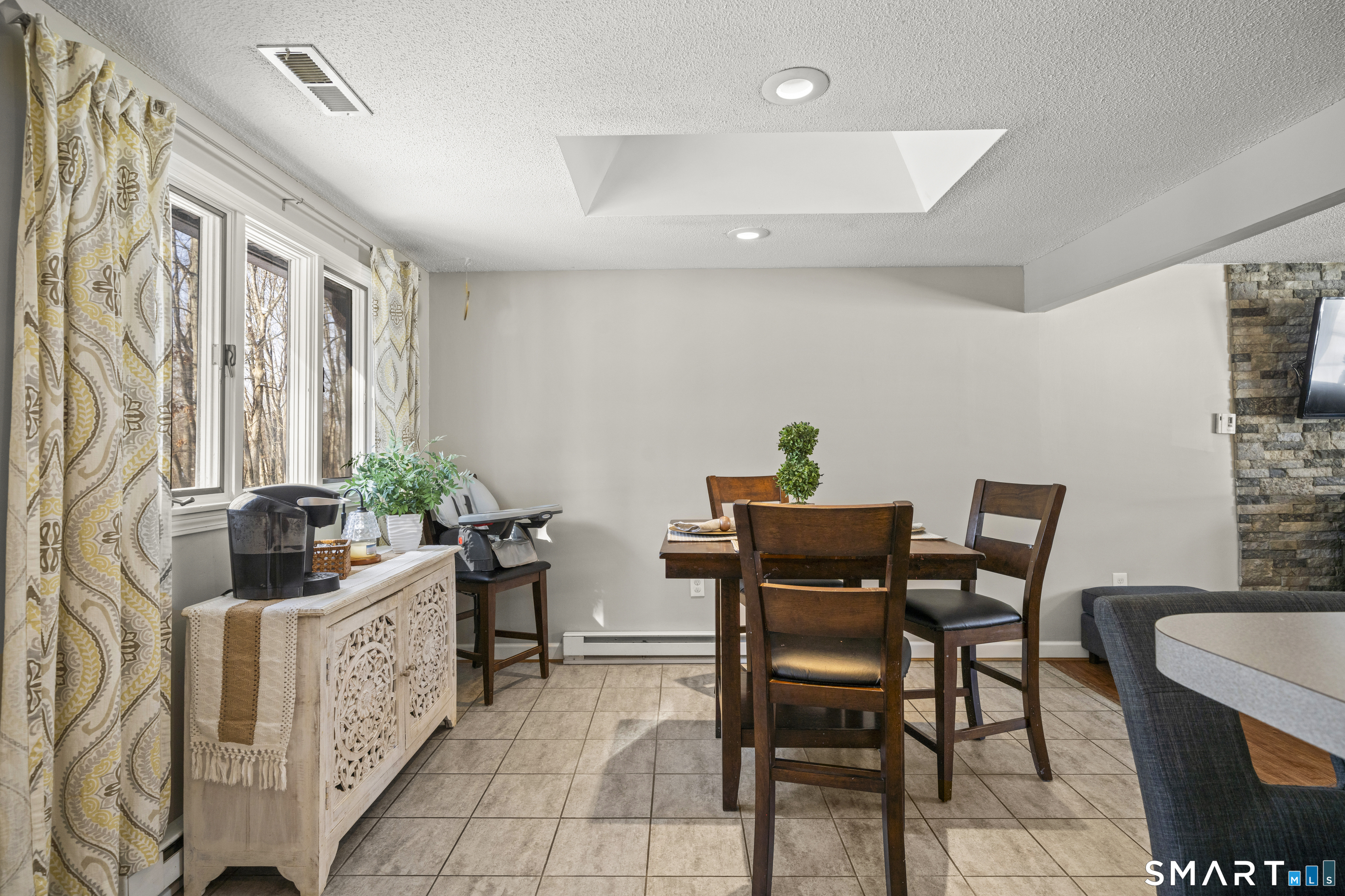 51 Barrett Road Enfield, CT 06082 - Photo 10 of 35 a view of a dining room with furniture window and outside view