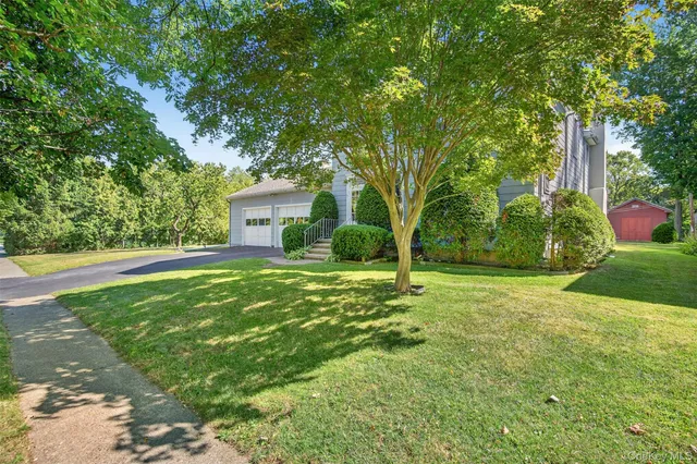 a house view with a garden space