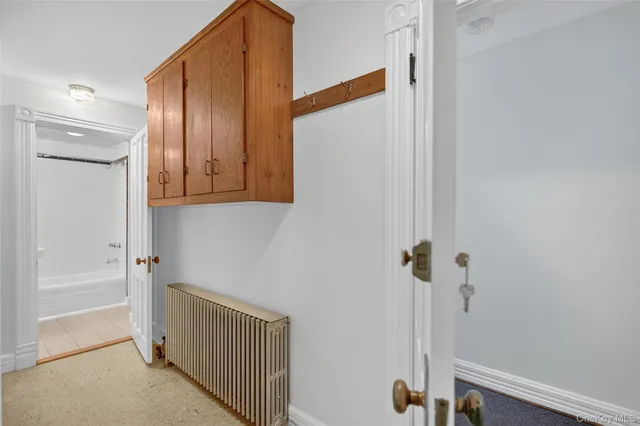a view of a hallway with closet