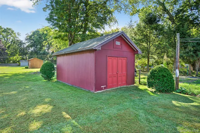 a view of backyard with green space
