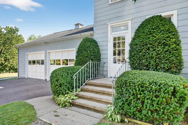 a view of a garden in front of house