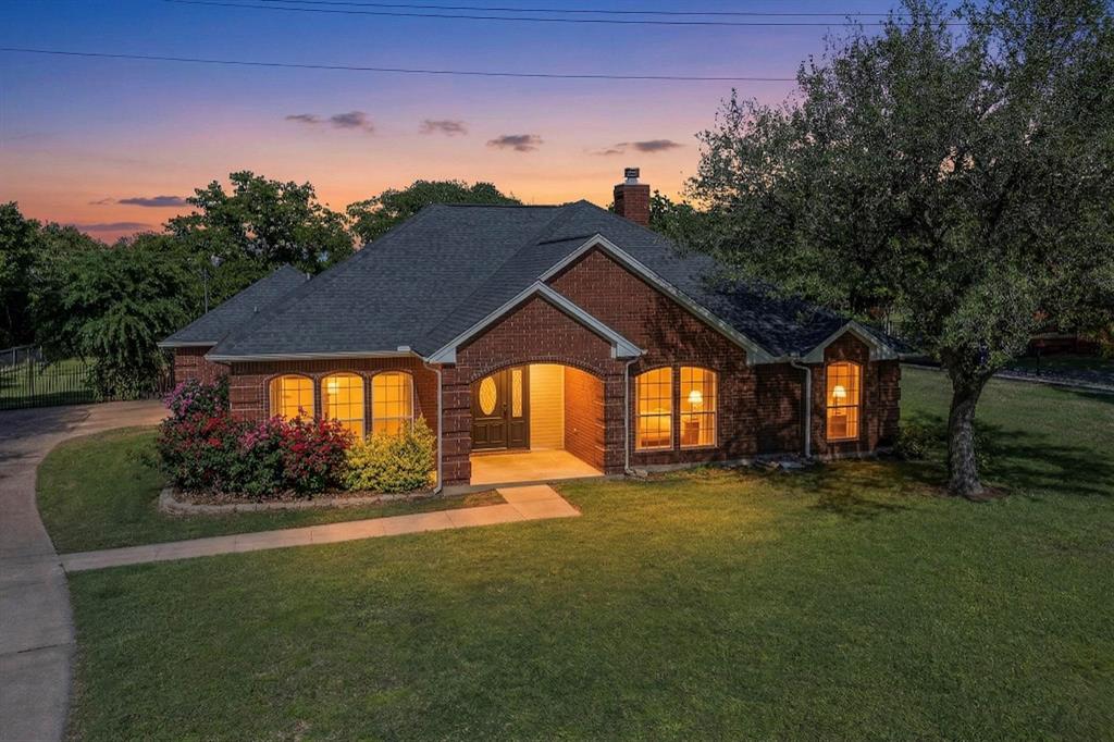 2601 Trail Tree Court Burleson, TX 76028 - Photo 1 of 40 View of front of house featuring brick siding, a front yard, and a chimney