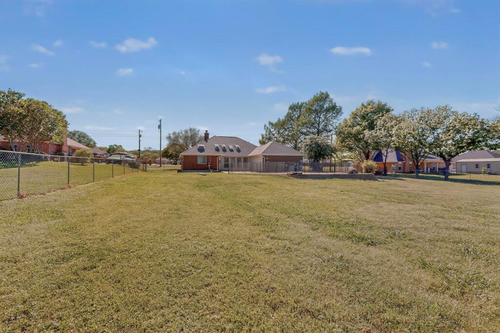 2601 Trail Tree Court Burleson, TX 76028 - Photo 39 of 40 View of yard featuring a residential view