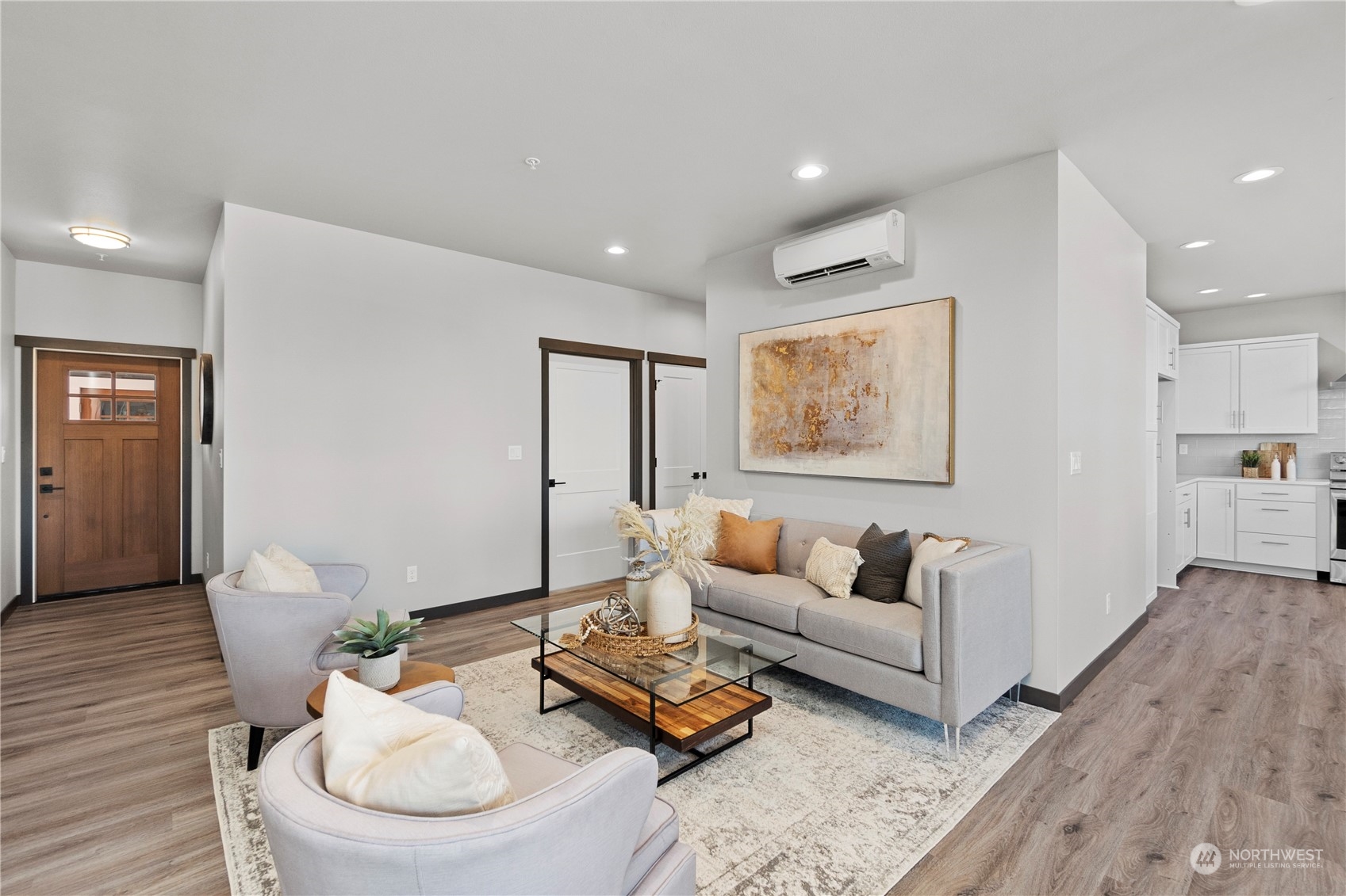 6441 Humphrey Road, Unit 4 Clinton, WA 98236 - Photo 12 of 40 a living room with furniture and wooden floor