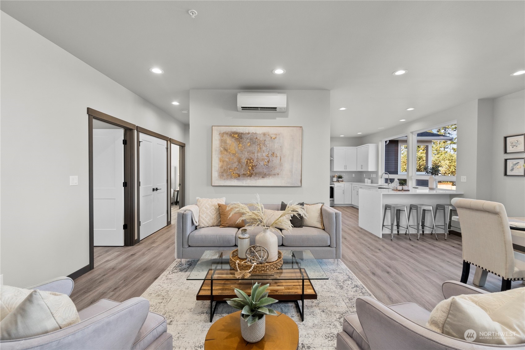 6441 Humphrey Road, Unit 4 Clinton, WA 98236 - Photo 13 of 40 a living room with furniture and kitchen view