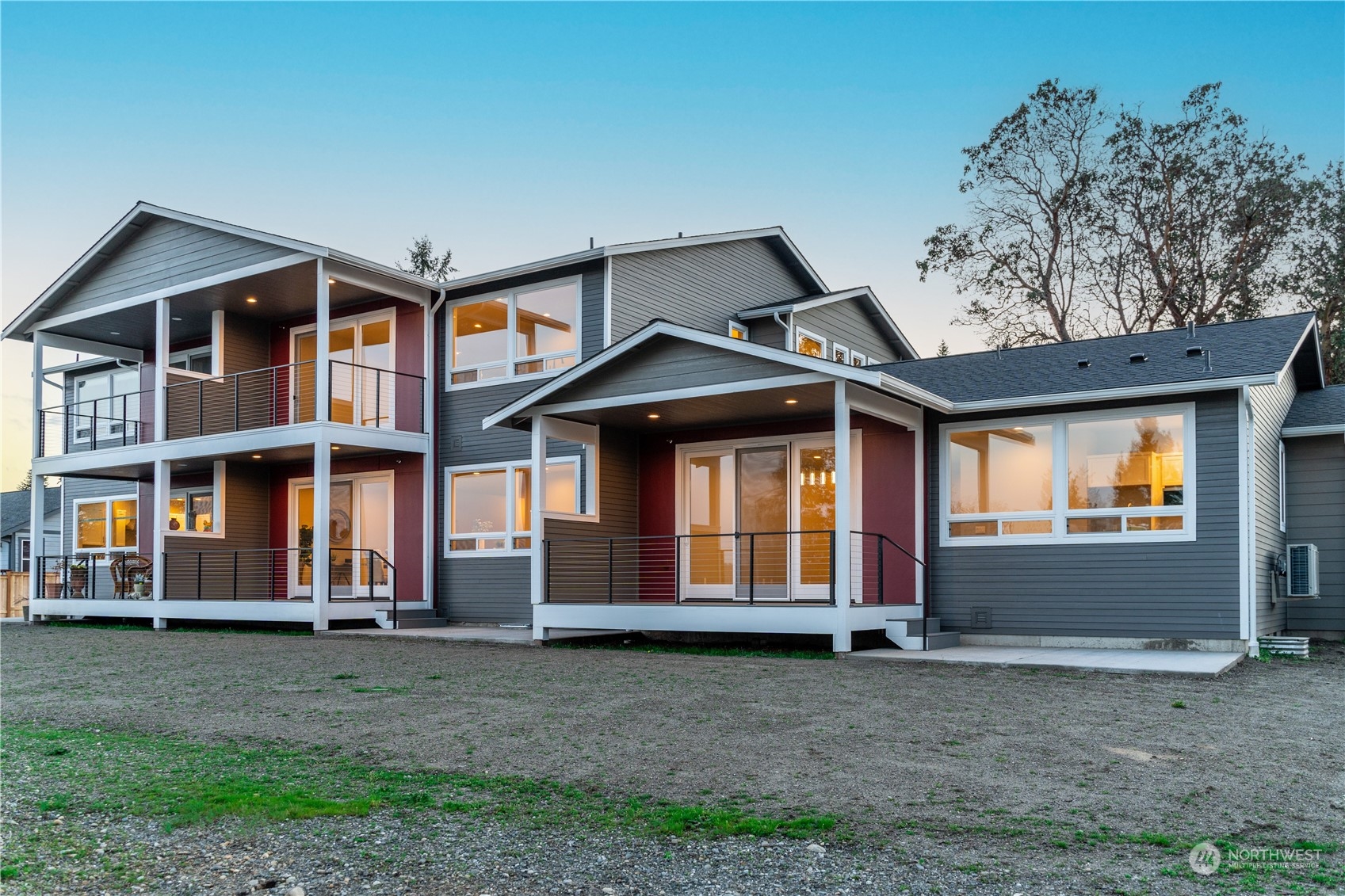 6441 Humphrey Road, Unit 4 Clinton, WA 98236 - Photo 30 of 40 a front view of a house with a yard