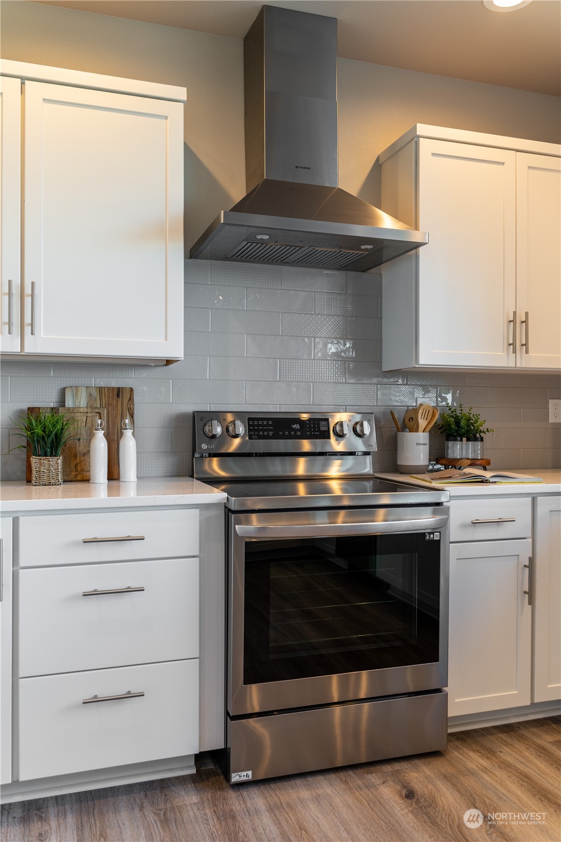6441 Humphrey Road, Unit 4 Clinton, WA 98236 - Photo 4 of 40 a stove top oven sitting inside of a kitchen