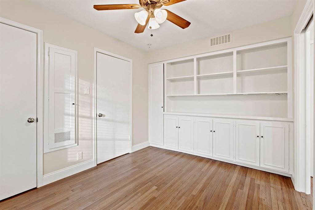 527 East Spring Valley Road Richardson, TX 75081 - Photo 11 of 19 a view of an empty room with wooden floor