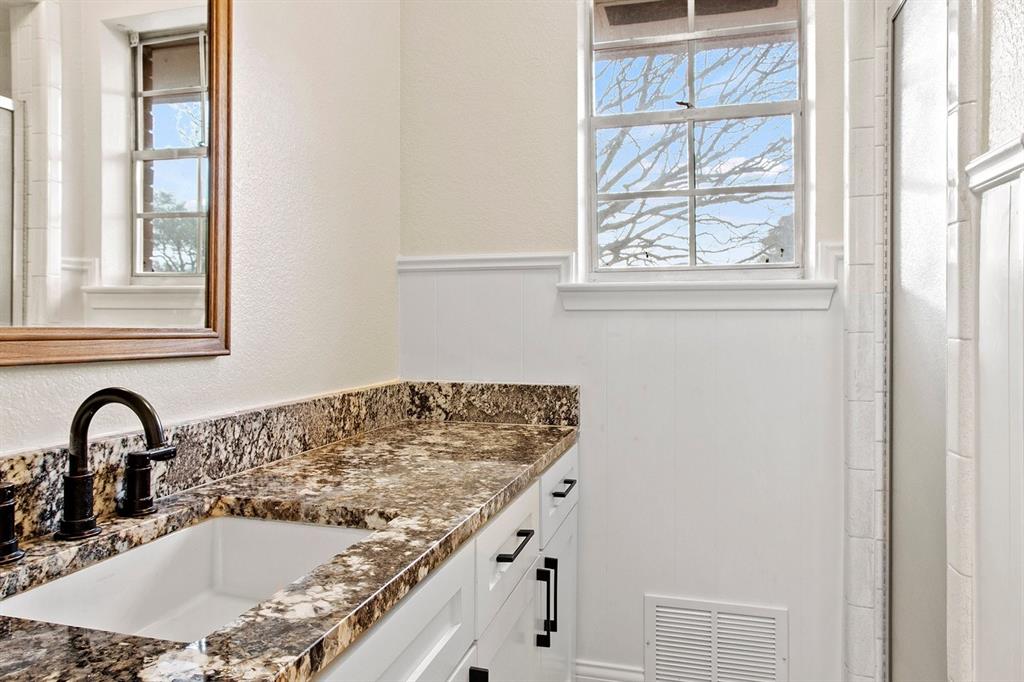 527 East Spring Valley Road Richardson, TX 75081 - Photo 17 of 19 a close view of a sink and a window