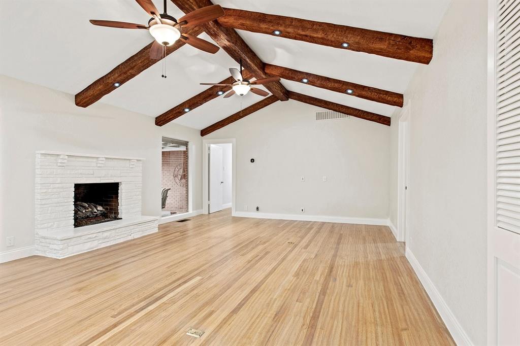 527 East Spring Valley Road Richardson, TX 75081 - Photo 4 of 19 a view of empty room with wooden floor