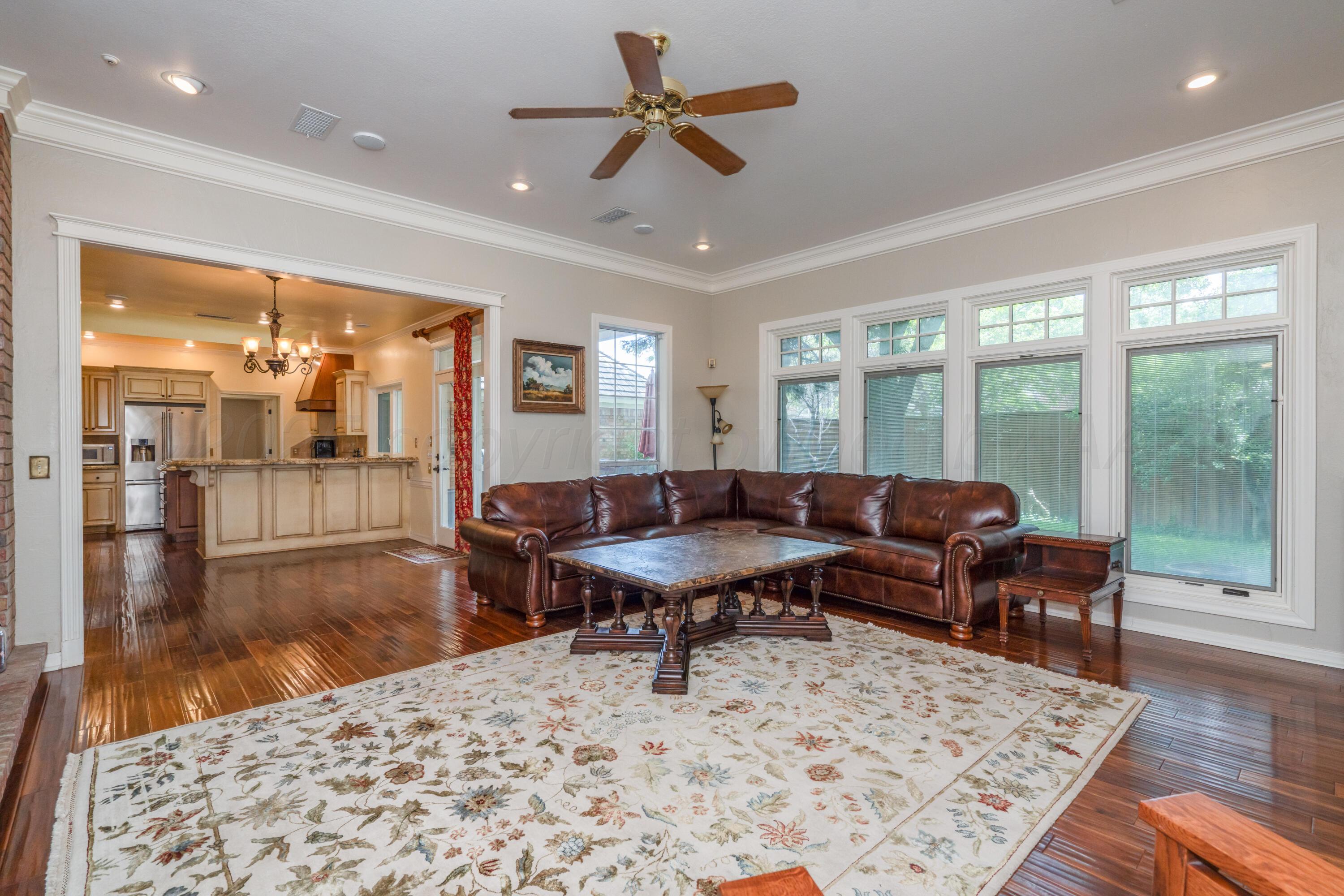 3501 Van Winkle Drive Amarillo, TX 79121 - Photo 18 of 35 a living room with furniture and wooden floor