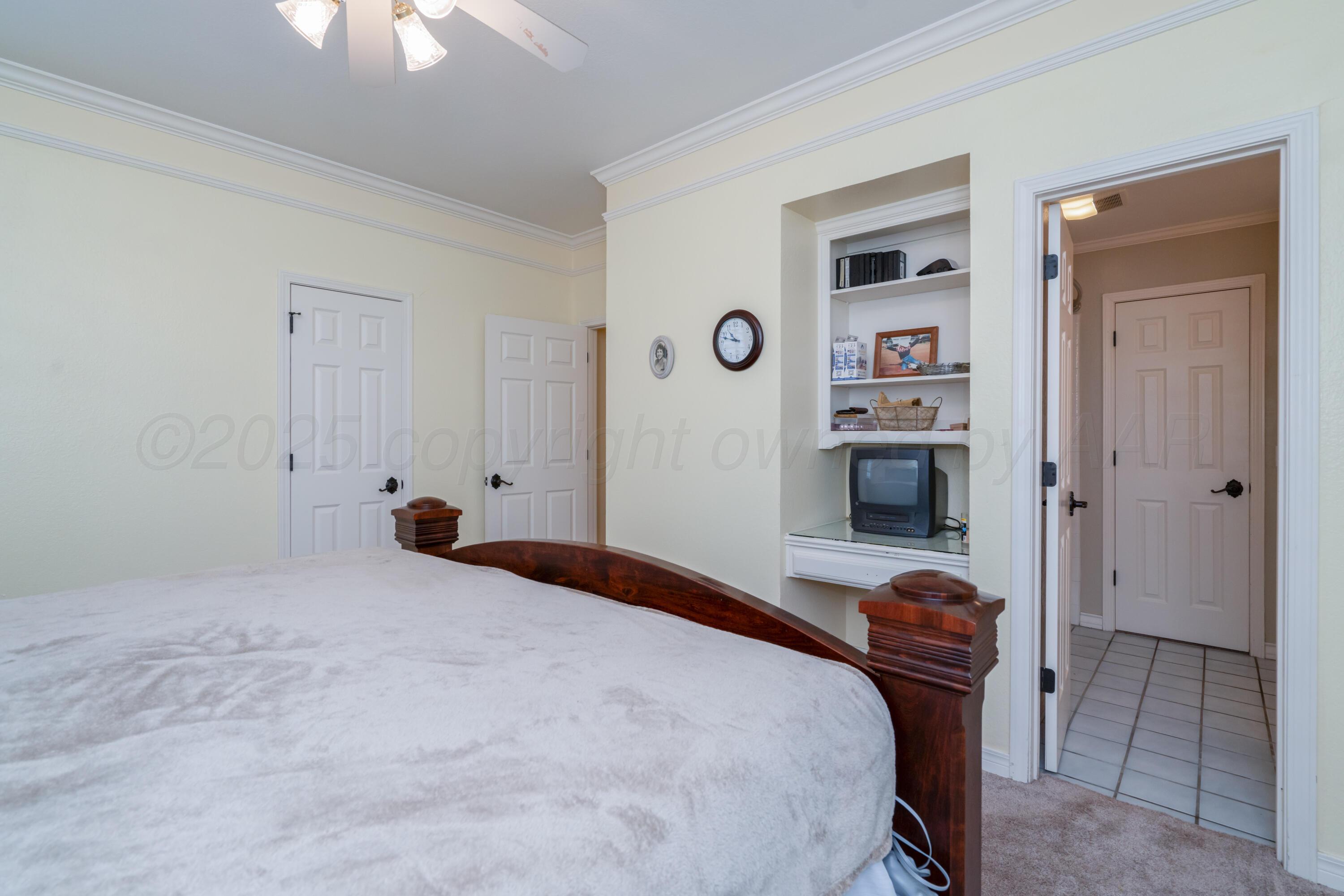 3501 Van Winkle Drive Amarillo, TX 79121 - Photo 25 of 35 a bedroom with a bed and a window