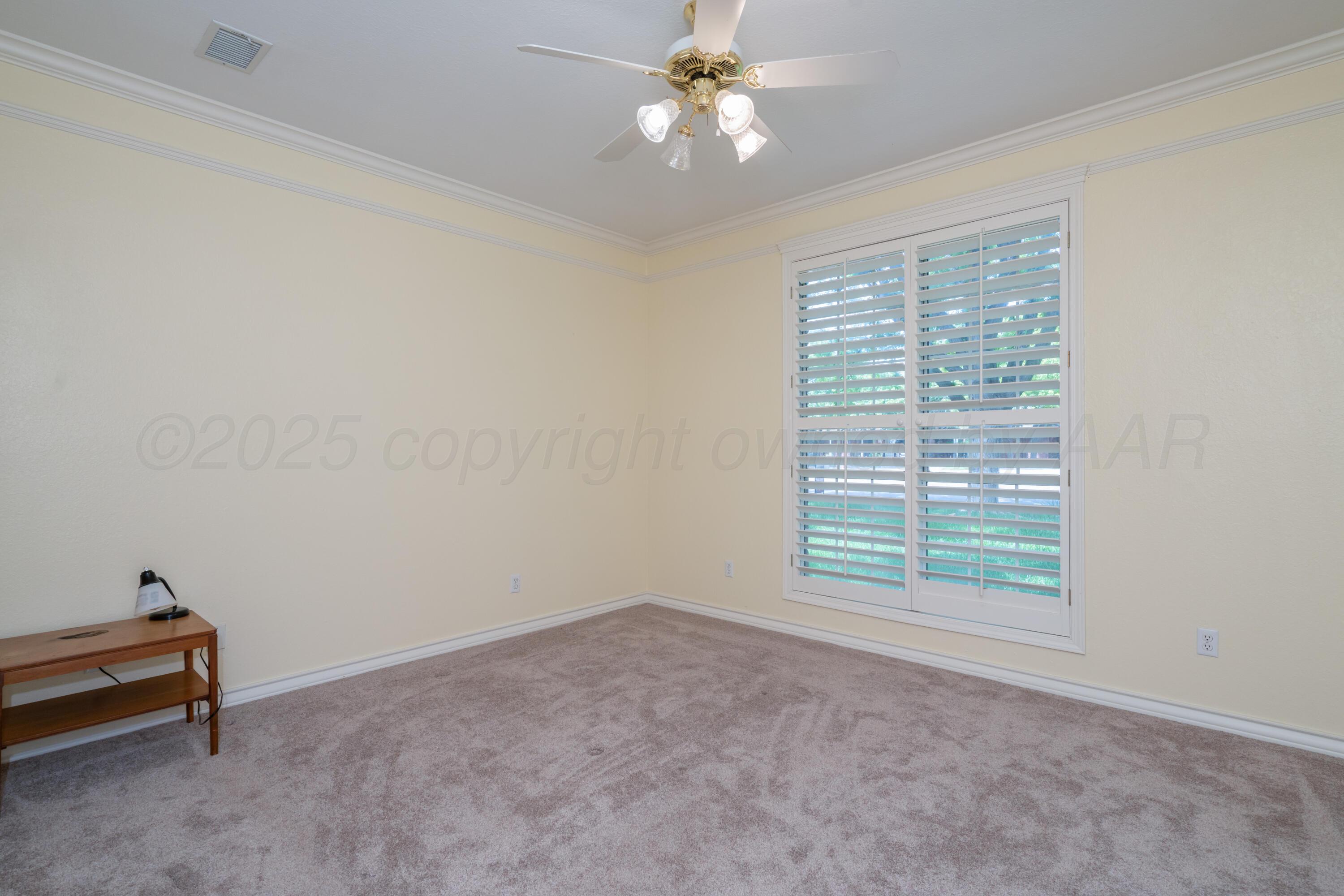 3501 Van Winkle Drive Amarillo, TX 79121 - Photo 28 of 35 a view of room with window and ceiling fan