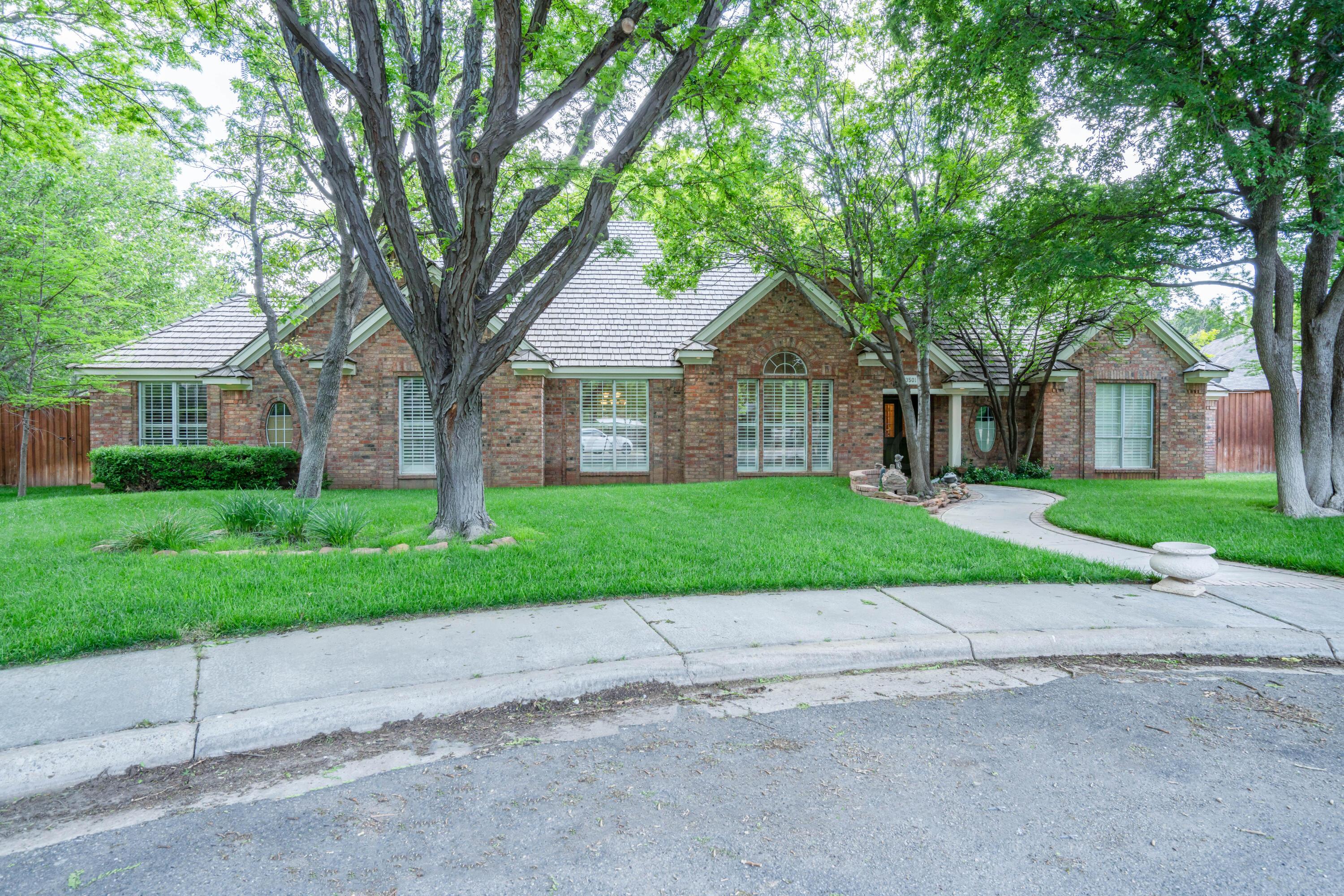 3501 Van Winkle Drive Amarillo, TX 79121 - Photo 3 of 35 front view of a house and a yard