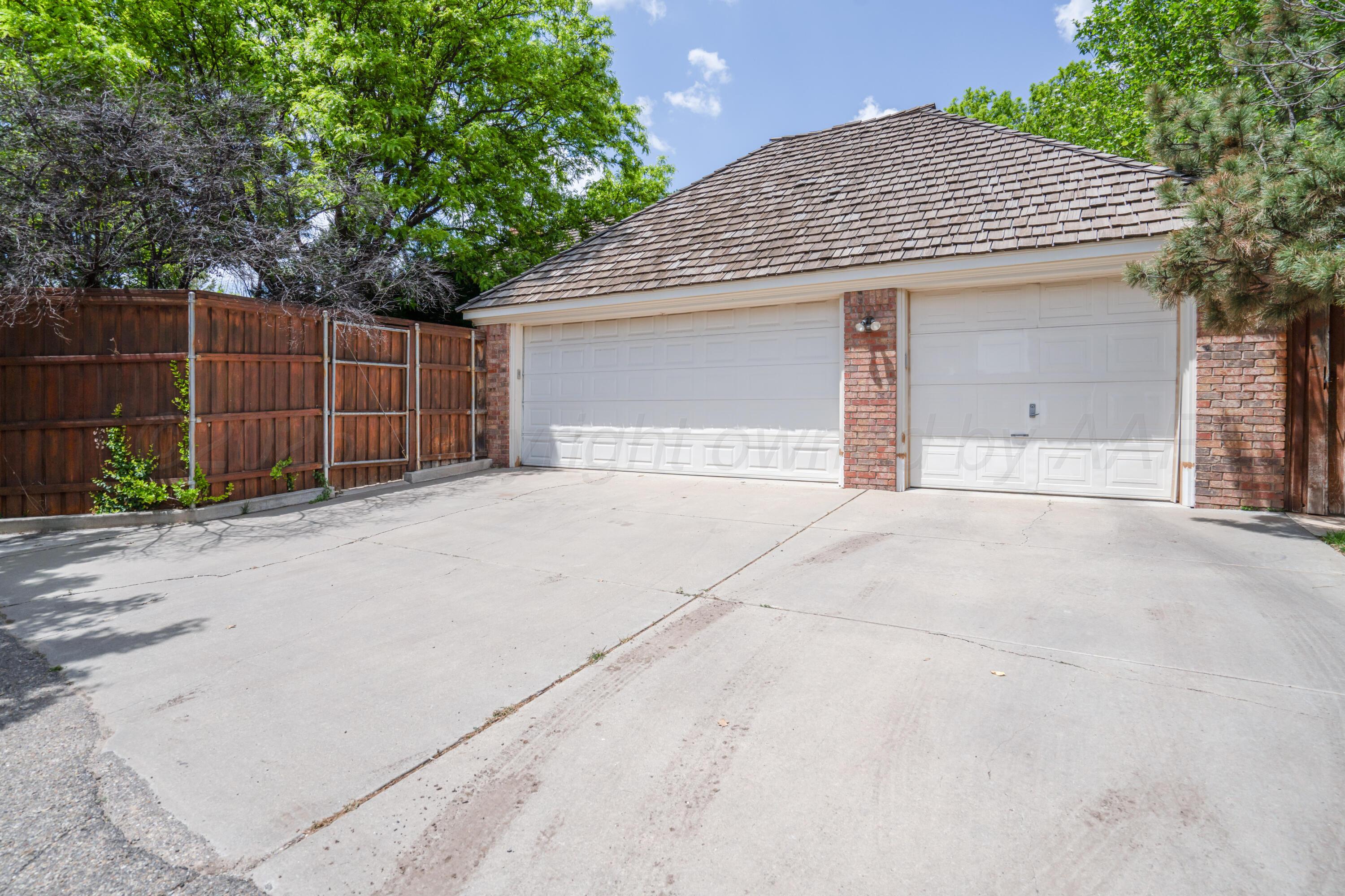 3501 Van Winkle Drive Amarillo, TX 79121 - Photo 35 of 35 a front view of a house with garage