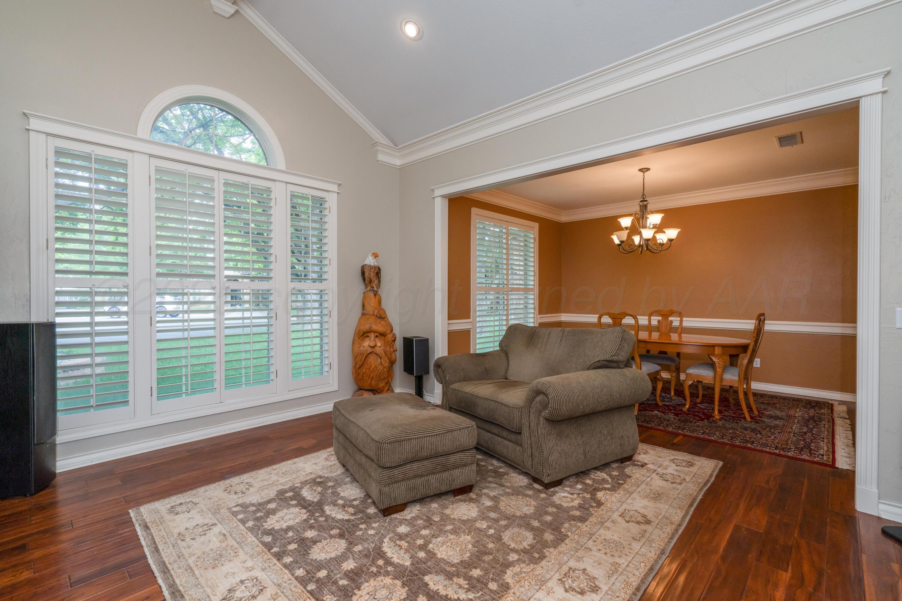 3501 Van Winkle Drive Amarillo, TX 79121 - Photo 6 of 35 a living room with furniture and a large window