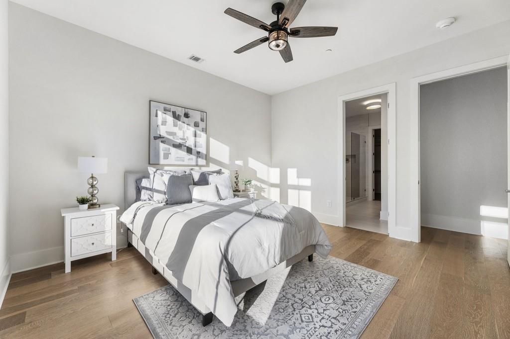 12455 Broadwell Road, Unit 202 Milton, GA 30004 - Photo 22 of 31 a bedroom with a bed and a window