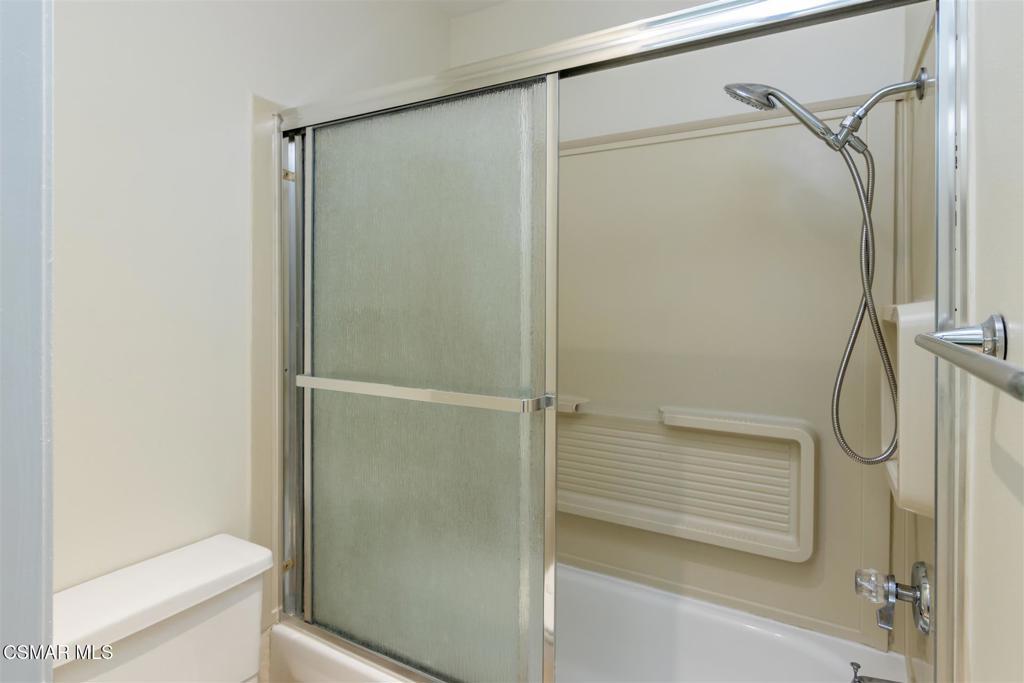 15175 Marquette Street, Unit D Moorpark, CA 93021 - Photo 12 of 22 a bathroom with a glass shower door