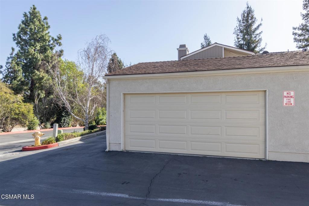 15175 Marquette Street, Unit D Moorpark, CA 93021 - Photo 18 of 22 a front view of a house with a yard