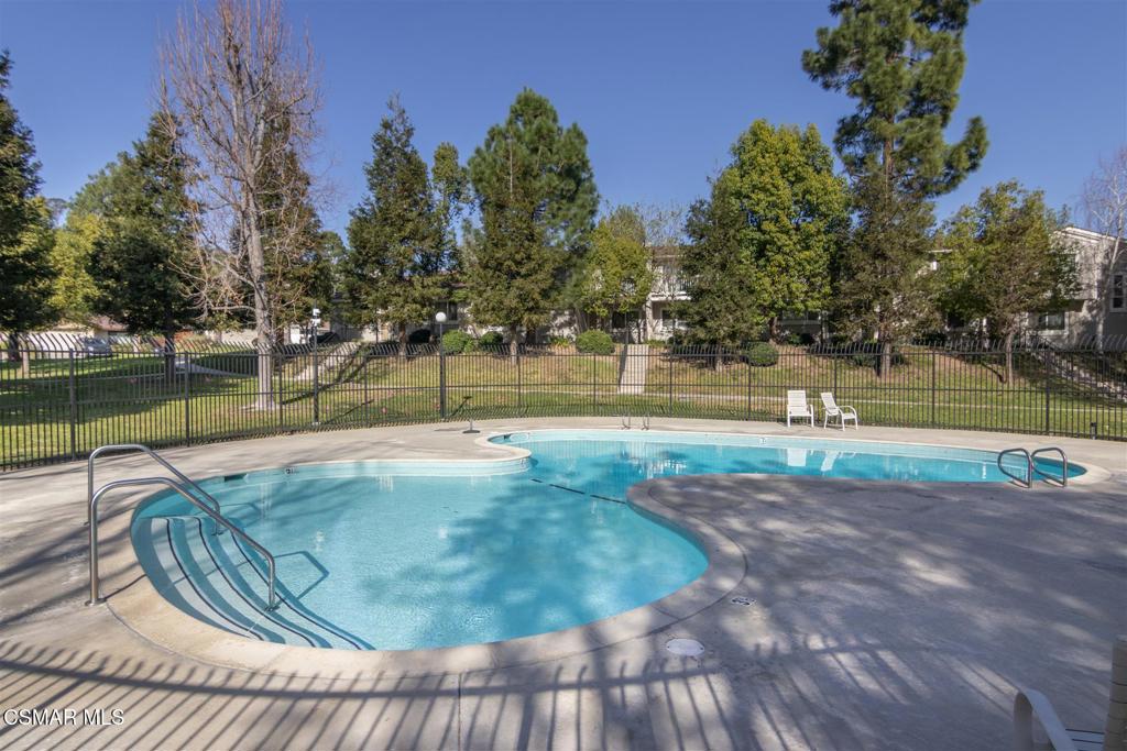 15175 Marquette Street, Unit D Moorpark, CA 93021 - Photo 19 of 22 a view of a swimming pool with a patio