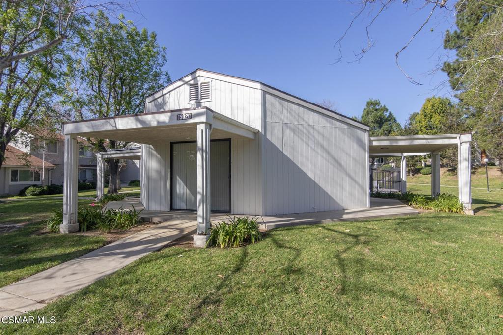15175 Marquette Street, Unit D Moorpark, CA 93021 - Photo 20 of 22 front view of a house with a yard