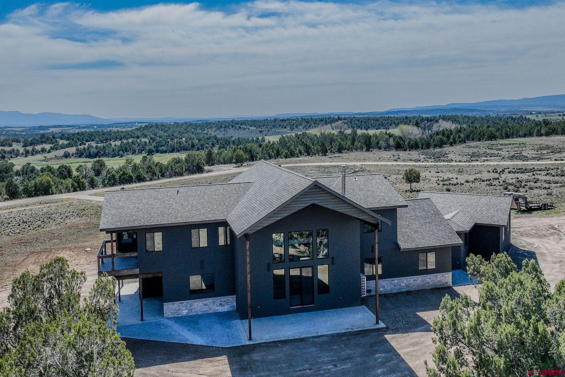 2077 Wrangler Way Durango, CO 81303 - Photo 2 of 43 an aerial view of a house