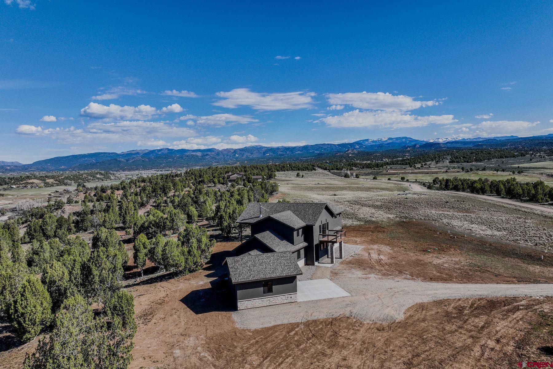 2077 Wrangler Way Durango, CO 81303 - Photo 41 of 43 a view of a lake with a mountain