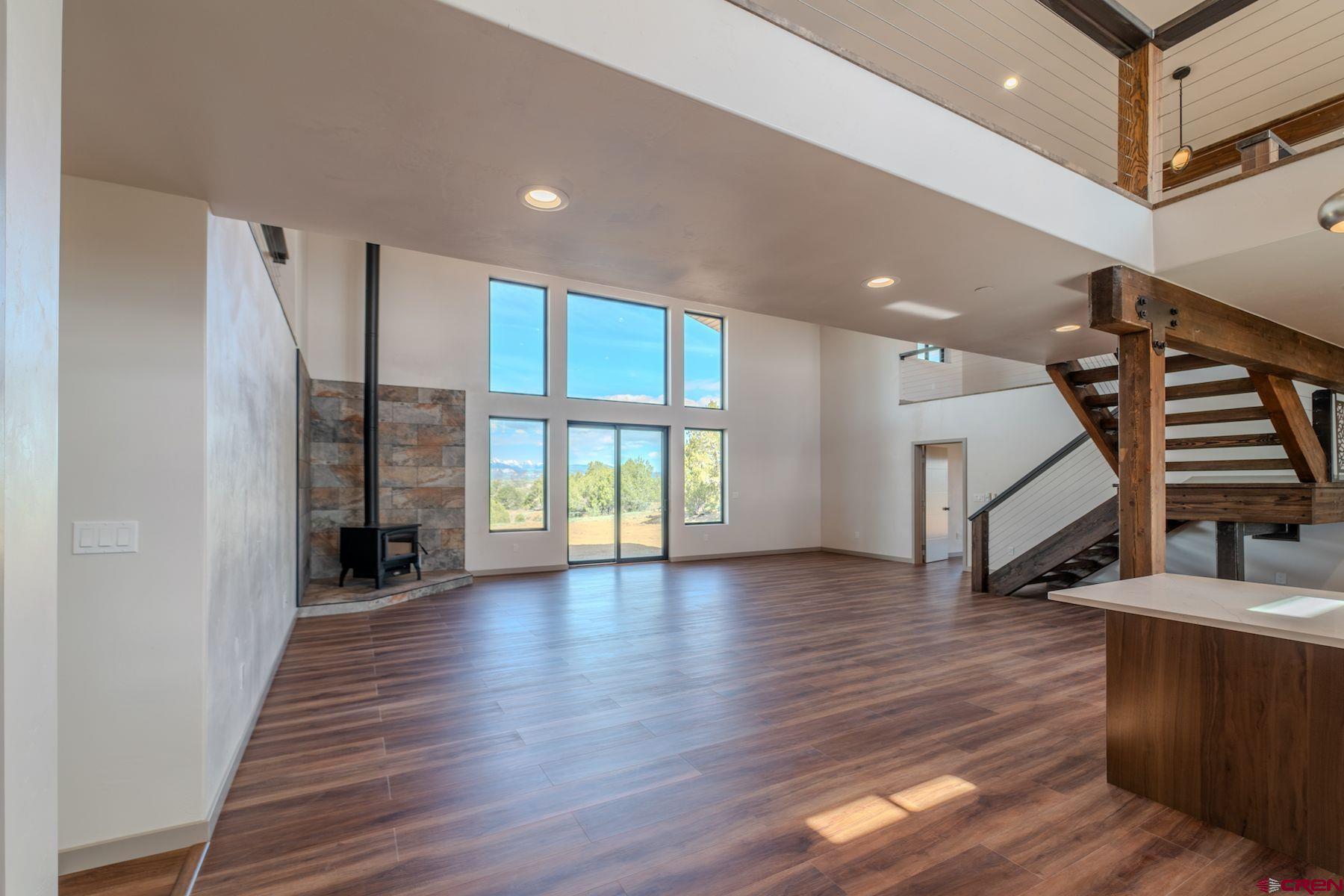 2077 Wrangler Way Durango, CO 81303 - Photo 10 of 43 a view of an entryway with wooden floor