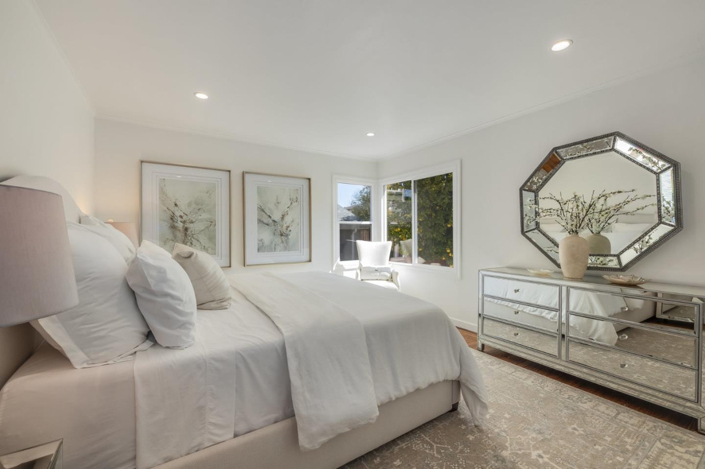 419 Millwood Drive Millbrae, CA 94030 - Photo 15 of 32 a bedroom with a large bed and a large window