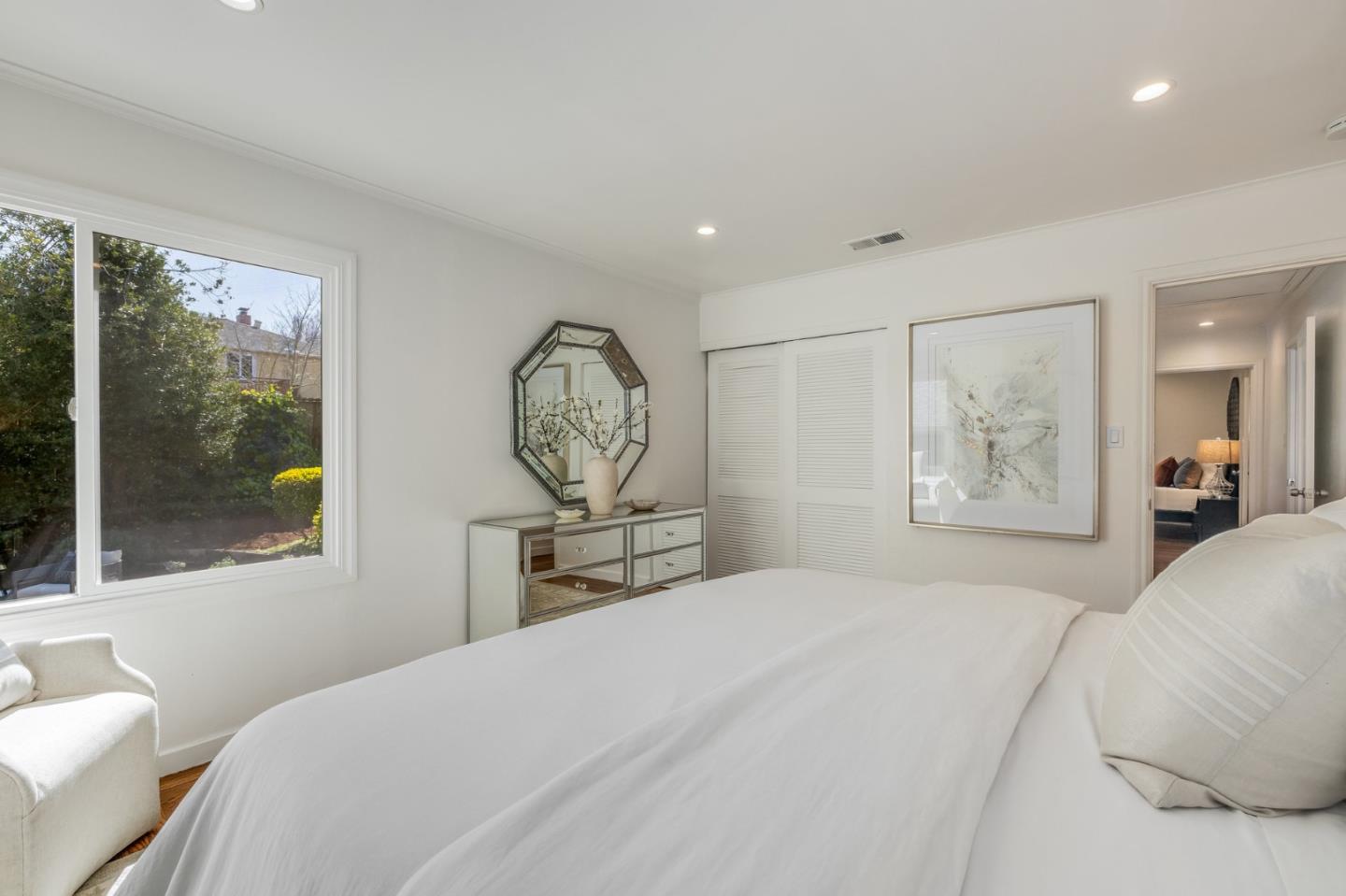 419 Millwood Drive Millbrae, CA 94030 - Photo 16 of 32 a bedroom with a large bed and a large window