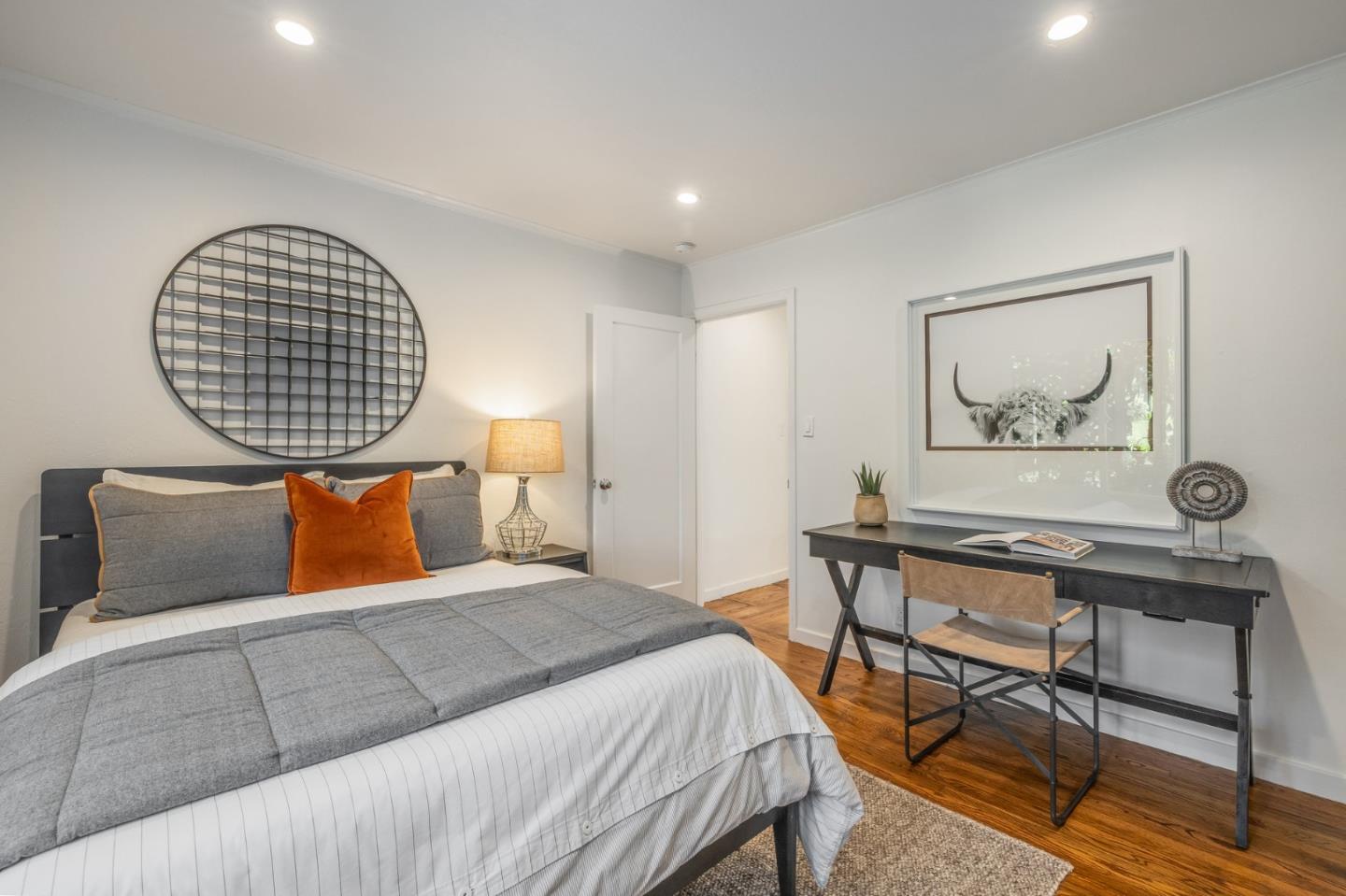 419 Millwood Drive Millbrae, CA 94030 - Photo 20 of 32 a bedroom with a bed a desk and chair