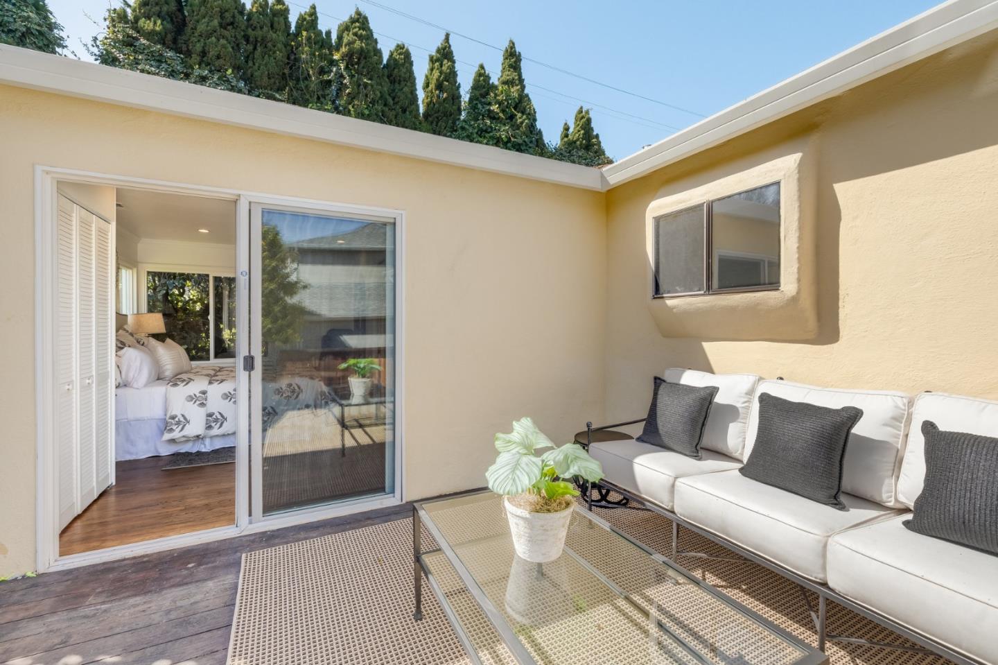 419 Millwood Drive Millbrae, CA 94030 - Photo 24 of 32 a outdoor living space with furniture and a potted plant