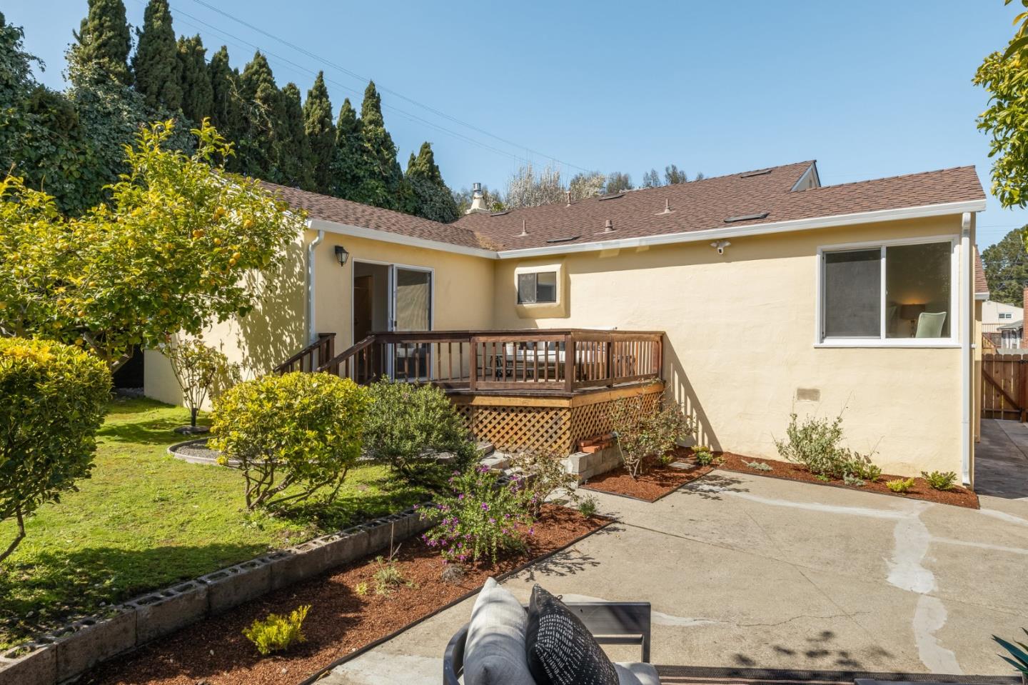 419 Millwood Drive Millbrae, CA 94030 - Photo 29 of 32 a view of a house with a yard and balcony