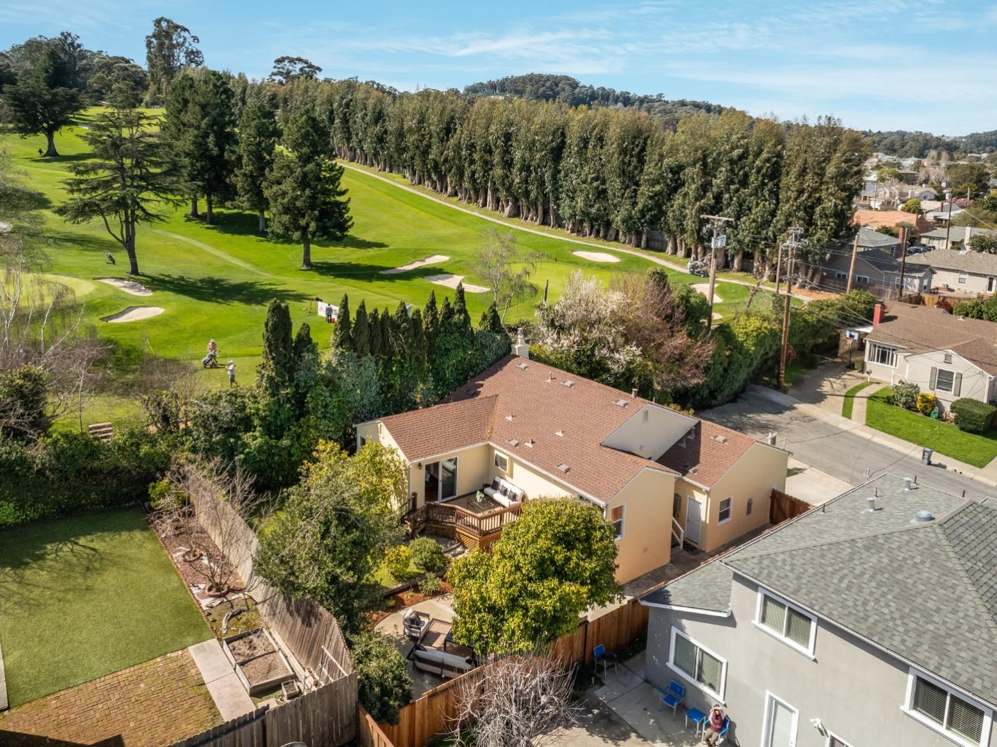419 Millwood Drive Millbrae, CA 94030 - Photo 30 of 32 an aerial view of a house with a garden and lake view