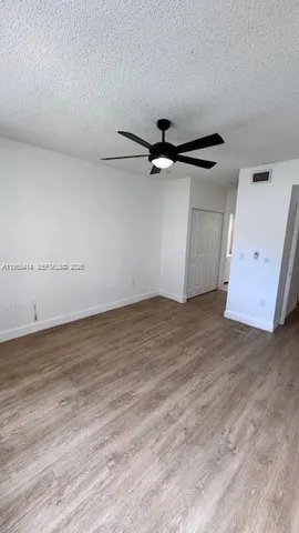 a view of a room with an empty space