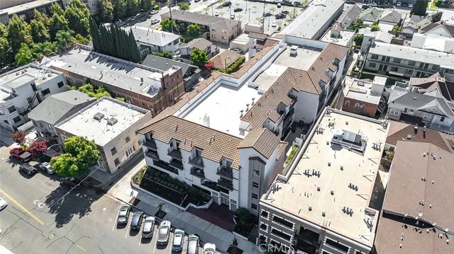 an aerial view of a houses with outdoor space