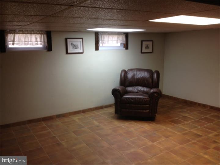 58 Ark Road Medford, NJ 08055 - Photo 11 of 13 a room with furniture and a window