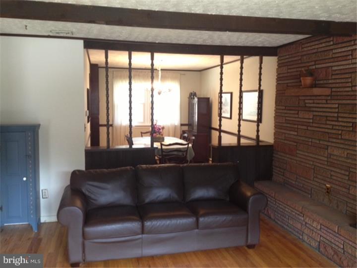 58 Ark Road Medford, NJ 08055 - Photo 3 of 13 a living room with couch and a table