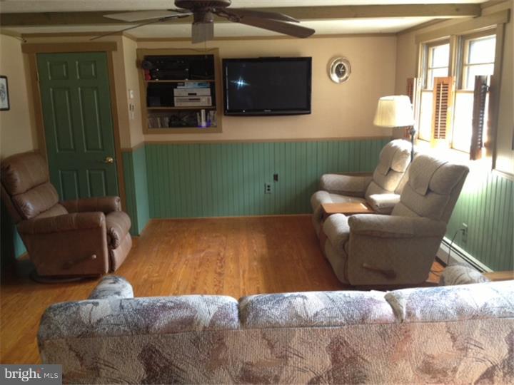 58 Ark Road Medford, NJ 08055 - Photo 4 of 13 a living room with furniture and a window