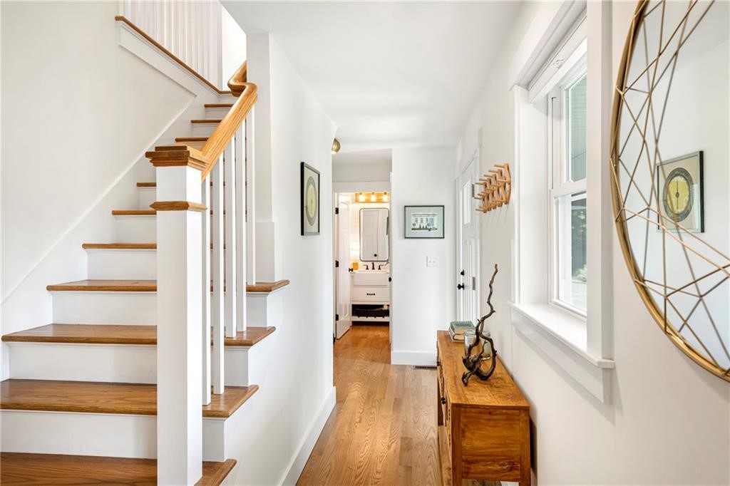 27 Massasoit Avenue Bristol, RI 02809 - Photo 4 of 7 Similar Staircase build from builder w hardwoods and railing style.