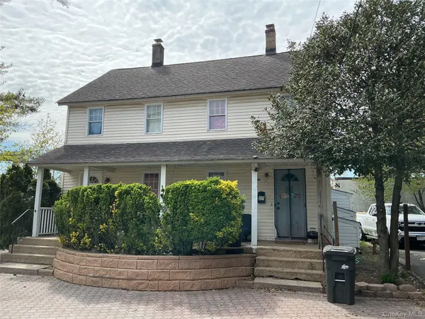 $879,999 | 241 Covert Street, Westbury, NY 11590