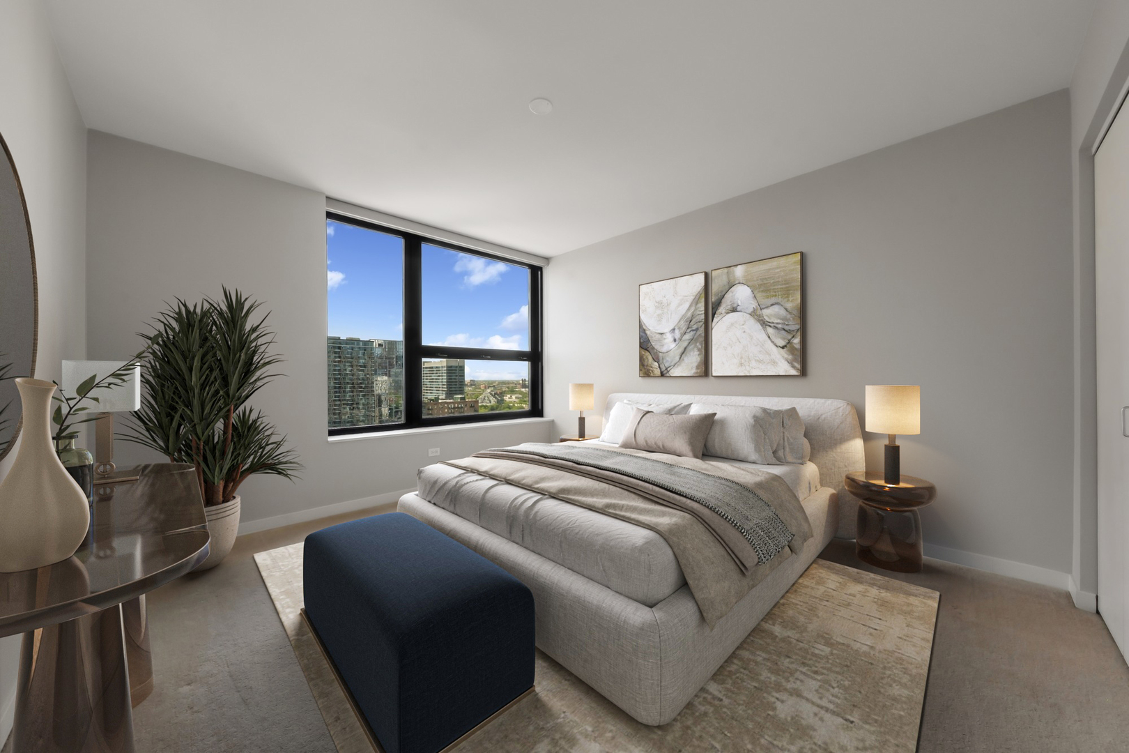 1160 South Michigan Avenue, Unit 2001 Chicago, IL 60605 - Photo 20 of 33 a bedroom with a large bed and a large window