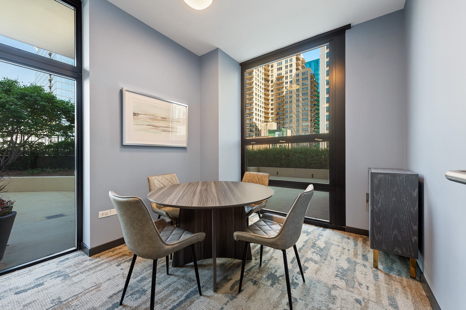 1160 South Michigan Avenue, Unit 2001 Chicago, IL 60605 - Photo 31 of 33 a view of a dining room with furniture and window
