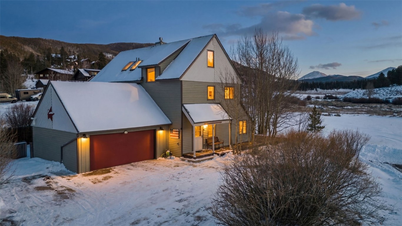 a view of a town with large trees