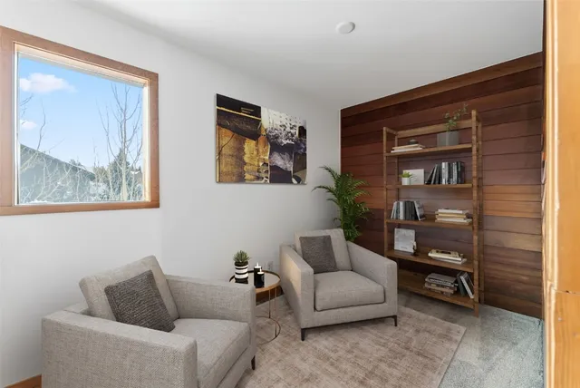 a view of a hallway with washer and dryer